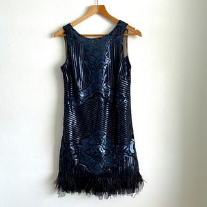 BCBG cocktail dress with sequins and feathers. Size XS.